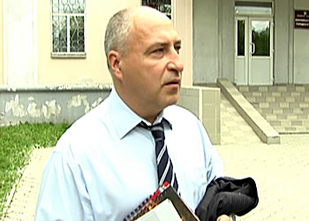 Л. Коротков