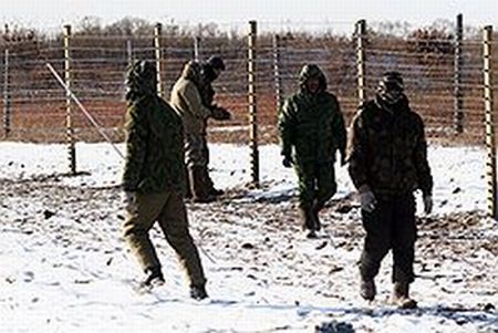 За китайской колючей проволокой больше нет хабаровских наделов, но и компенсаций за изъятые сельхозугодия у хабаровчан тоже нет. Фото: Евгений Переверзев/Коммерсантъ