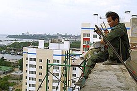 Попавший в число наиболее дорогих по жилью городов Хабаровск не спасет и приход на рынок китайских застройщиков, полагают некоторые эксперты. Фото: Евгений Переверзев /  Коммерсантъ