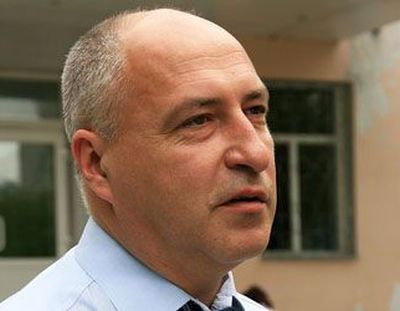 Л. Коротков